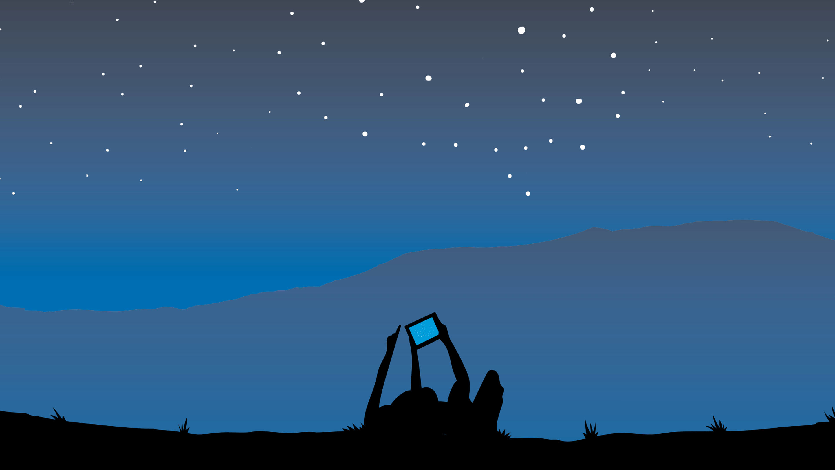 people looking at the stars with a phone